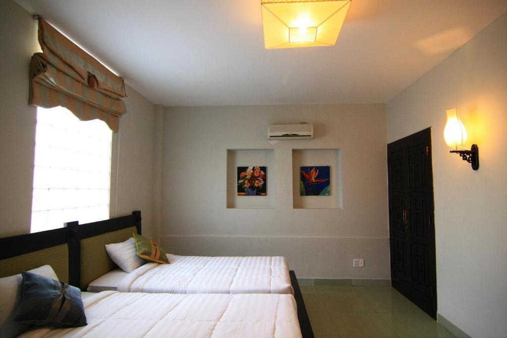 Faifoo Boutique Hotel Хошимин Стая снимка