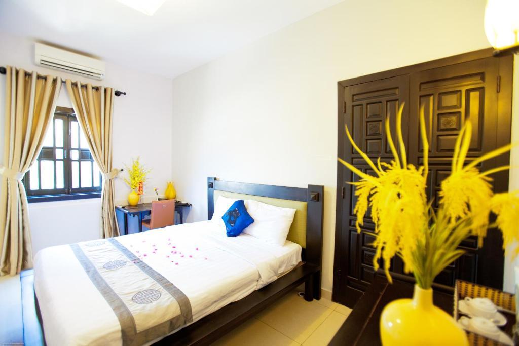 Faifoo Boutique Hotel Хошимин Стая снимка