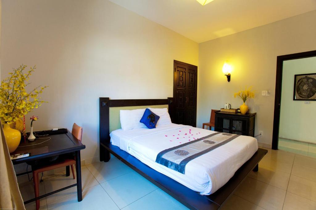Faifoo Boutique Hotel Хошимин Стая снимка