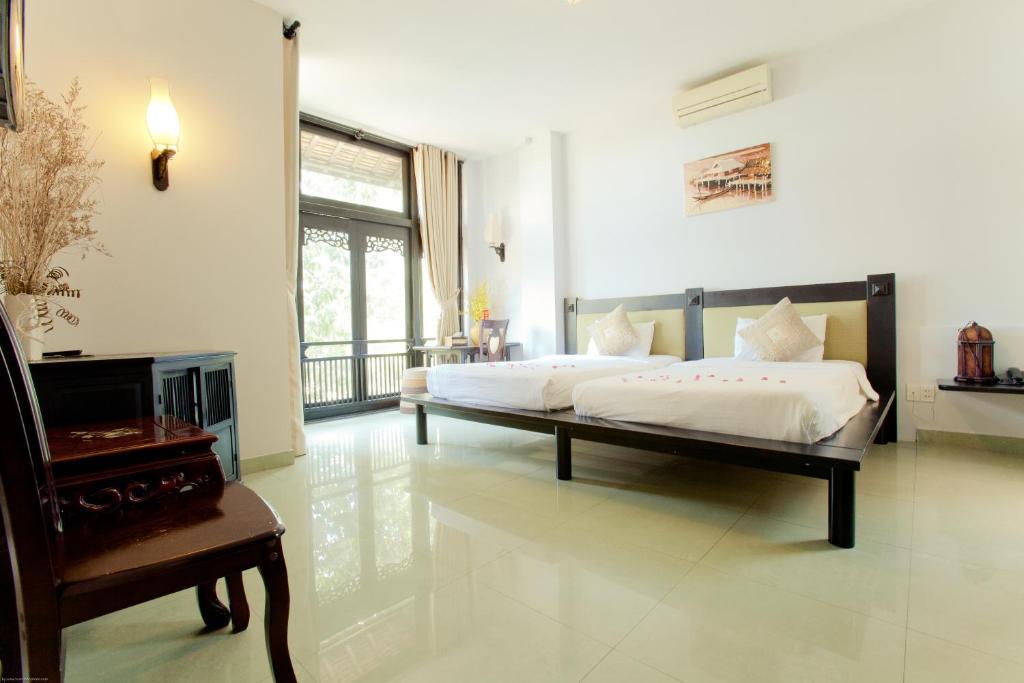Faifoo Boutique Hotel Хошимин Стая снимка