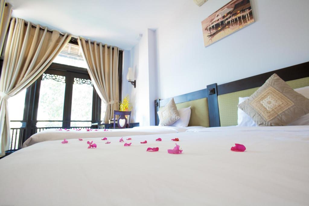 Faifoo Boutique Hotel Хошимин Стая снимка